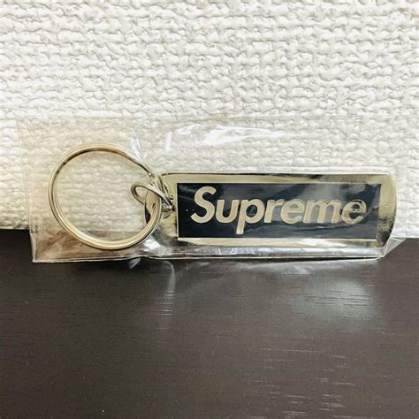 supreme14ss unhs metal tag box logo black polished keychain|Metal Tag Keychain .